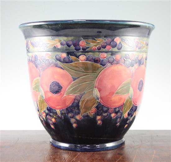 A large William Moorcroft pomegranate pattern jardiniere, dated 1919, 31.5 x 36cm, damage